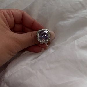 Silver ring with purple stone